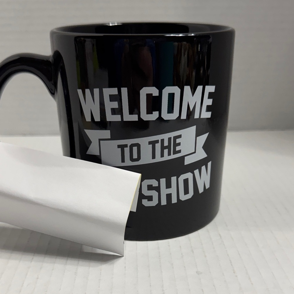 Spencer's Black Welcome to the Show Mug